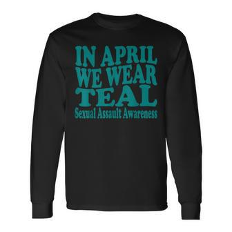 In April We Wear Teal Sexual Assault Awareness Month Groovy Long Sleeve T-Shirt - Monsterry