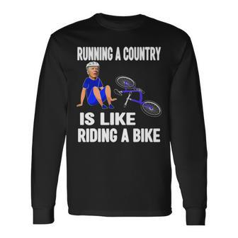 Biden Falls Off Bike Joe Biden Falling Off His Bicycle Long Sleeve T-Shirt | Mazezy