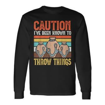 Caution I've Been Known To Throw Things Potter Scultor Clay Long Sleeve T-Shirt - Thegiftio UK