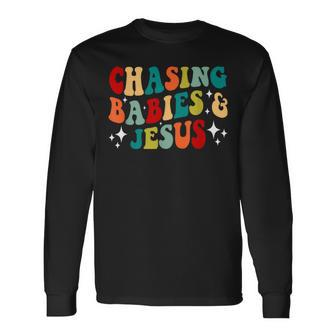 Chasing Babies And Jesus Chasing Babies & Jesus Christian Long Sleeve T-Shirt | Mazezy