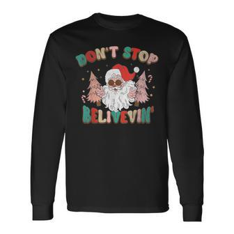 Don't Stop Believing Santa Claus Christmas Xmas Saying Long Sleeve T-Shirt - Monsterry