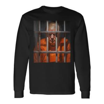 Donald Trump Behind Bars Hot Orange Jumpsuit Humor Long Sleeve T-Shirt - Monsterry AU