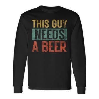 This Guy Needs A Beer Pun Dad Birthday Father's Day Long Sleeve T-Shirt - Thegiftio UK