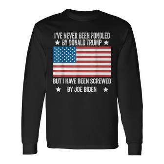 I’Ve Never Been Fondled By Donald Trump But Screwed By Biden Long Sleeve T-Shirt - Seseable