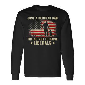Just A Regular Dad Trying Not To Raise Liberals Father's Day Long Sleeve T-Shirt - Monsterry