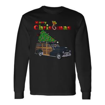 A Super Classic Christmas Woody Carrying A Tree Home Long Sleeve T-Shirt - Monsterry