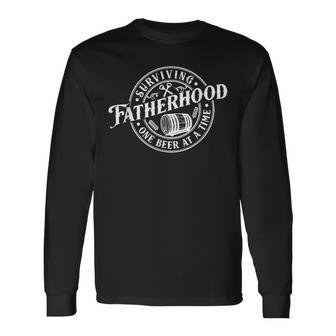Surviving Fatherhood One Beer At A Time Dad Father's Day Long Sleeve T-Shirt - Seseable