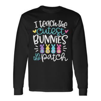 I Teach The Cutest Bunnies In The Patch Easter Eggs Teacher Long Sleeve T-Shirt | Mazezy