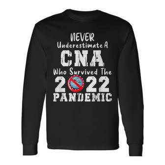 Never Underestimate A Cna Who Survived The 2022 Pandemic Long Sleeve T-Shirt - Thegiftio UK