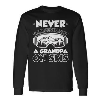 Never Underestimate A Grandpa On Skis Winter Long Sleeve T-Shirt - Seseable