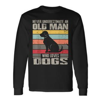 Vintage Never Underestimate An Old Man Who Loves Dogs Cute Long Sleeve T-Shirt - Thegiftio UK