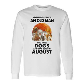 Never Underestimate An Old Man Who Loves Dogs Born In August Long Sleeve T-Shirt - Monsterry AU