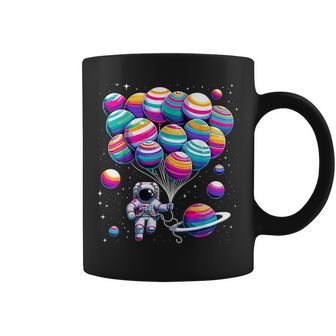 Astronaut Holding Planet Balloons Stem Science Coffee Mug - Monsterry