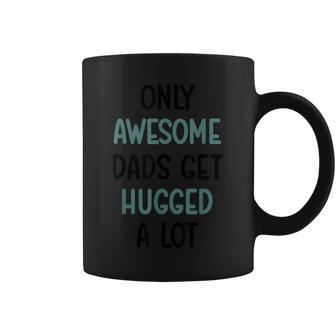 Only Awesome Dads Get Hugged A Lot Fathers Day From Coffee Mug - Monsterry