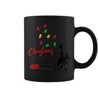 Christmas 2023 Loading Cowboy Lights Coffee Mug - Monsterry DE