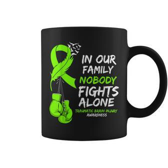In Our Family Nobody Fights Alone Traumatic Brain Injury Coffee Mug - Monsterry AU