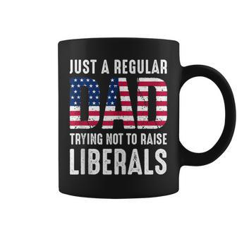 Father's Day Just A Regular Dad Trying Not To Raise Liberals Coffee Mug - Monsterry DE