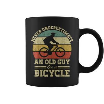 Never Underestimate An Old Guy On A Bicycle Cycling Coffee Mug - Seseable