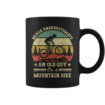 Never Underestimate An Old Guy On A Mountain Bike Coffee Mug - Seseable