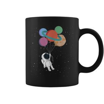 Happy Spaceman Keeps Planets Like Balloons In Space By Glow Coffee Mug - Monsterry DE