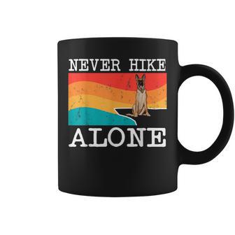 Never Hike Alone Belgian Malinoi Graphic Hiking Coffee Mug - Monsterry