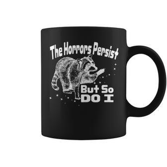 The Horrors Persist But So Do I Humor Mental Health Coffee Mug - Monsterry AU