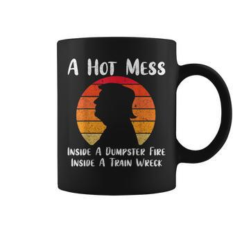 A Hot Mess Inside A Dumpster Fire Inside A Train Wreck Trump Coffee Mug - Monsterry UK