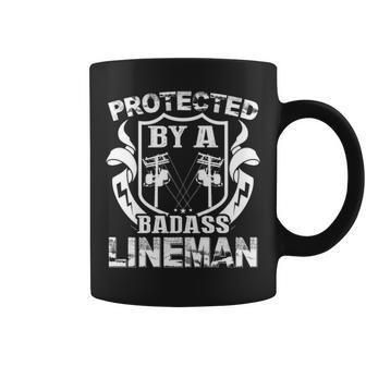 Protected By A Badass Lineman Coffee Mug | Mazezy