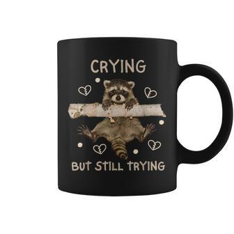 Raccoon Crying But Still Trying Meme Mental Health Coffee Mug - Monsterry DE