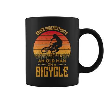 Retro Never Underestimate An Old Man On A Bicycle Coffee Mug - Seseable