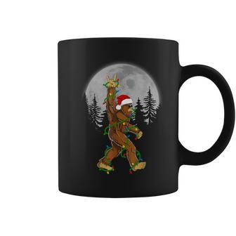 Santa Bigfoot Christmas Sasquatch Rock Roll Believe Pajamas Coffee Mug - Thegiftio UK