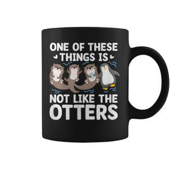 Sea Otters Penguin One Of These Things Not Like The Otters Coffee Mug - Monsterry