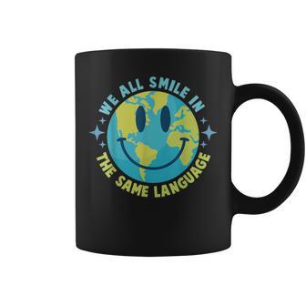 We All Smile In The Same Language Esl Teacher Coffee Mug - Monsterry DE