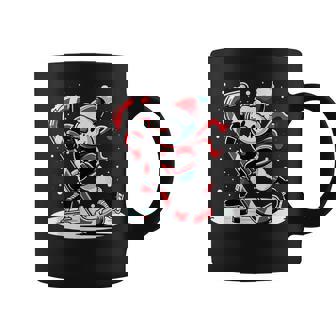 A Snowman Playing Hockey With A Candy Cane Hockey Stick Coffee Mug - Thegiftio