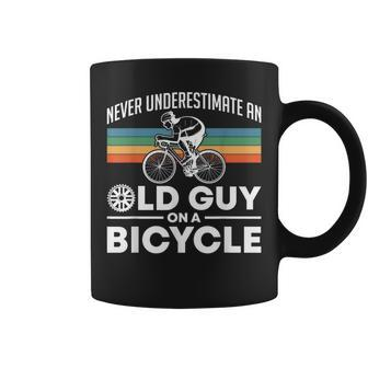 Never Underestimate An Old Guy On A Bicycle Retro Vintage Coffee Mug - Monsterry CA