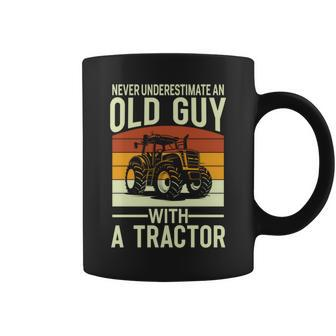 Never Underestimate An Old Guy With A Tractor Farmer Coffee Mug - Seseable