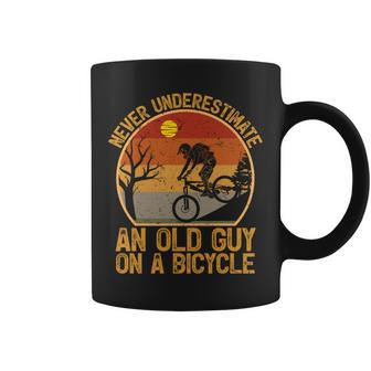 Vintage Retro Never Underestimate An Old Guy On A Bicycle Coffee Mug | Mazezy