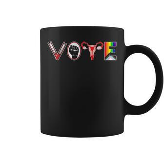 Vote Books Fist Ovaries Lgtbq Feminist Women Coffee Mug - Seseable