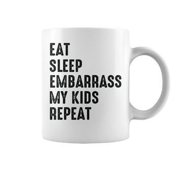 Eat Sleep Embarrass Kids Repeat Dad Coffee Mug | Crazezy UK