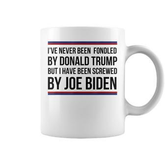 I've Never Been Fondled By Donald Trump But Screwed By Biden Coffee Mug - Seseable