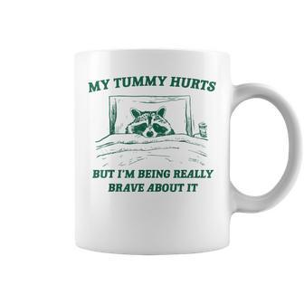 My Tummy Hurts But I'm Being Really Brave Raccoon Coffee Mug - Seseable