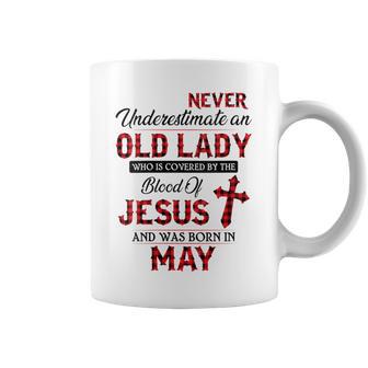 Never Underestimate An Old Lady Who Is Covered By-May Coffee Mug - Monsterry DE