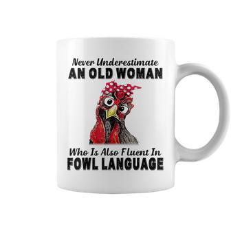 Never Underestimate An Old Woman Fluent In Fowl Language Coffee Mug - Monsterry