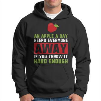 An Apple A Day Keeps Anyone Away If You Throw It Hard Enough Hoodie - Monsterry