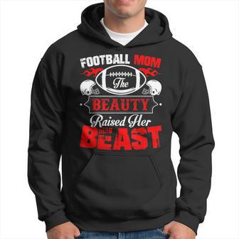 The Beauty Raised Her Beast Football Mom Hoodie - Monsterry CA