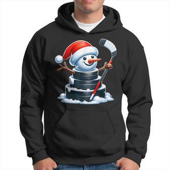 Cartoon Ice Hockey Puck Snowman With Santa Hat Christmas Hoodie - Monsterry UK