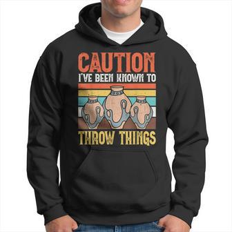 Caution I've Been Known To Throw Things Potter Scultor Clay Hoodie - Thegiftio UK
