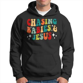 Chasing Babies And Jesus Chasing Babies & Jesus Christian Hoodie | Mazezy
