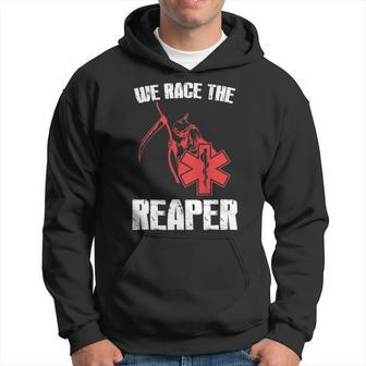 Emt Ems And Paramedic T We Race The Reaper Hoodie | Mazezy