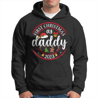 First Christmas As A Daddy Family Santa Hat Xmas Pjs New Dad Hoodie - Seseable